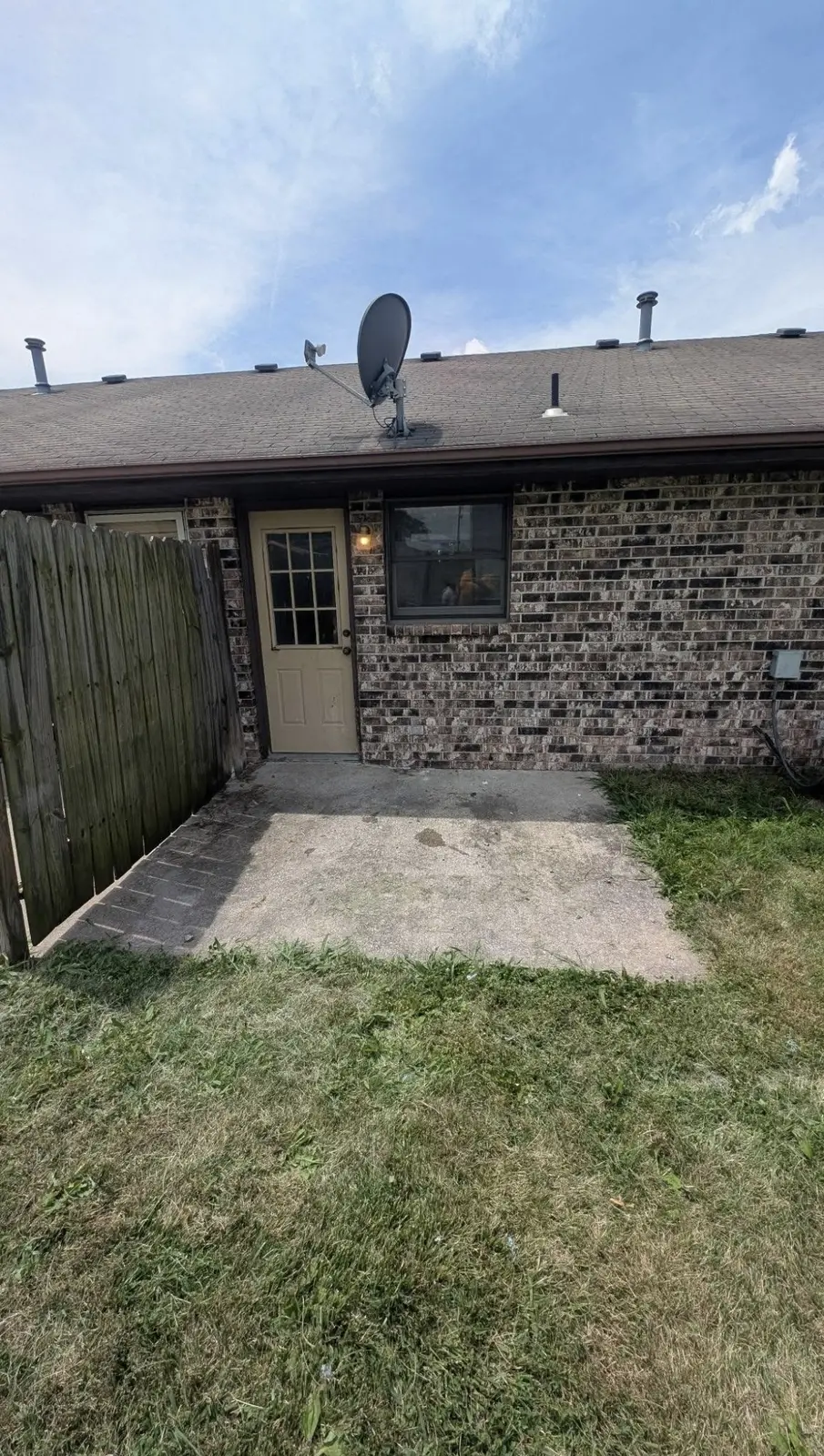 Backyard patio cleared after junk removal