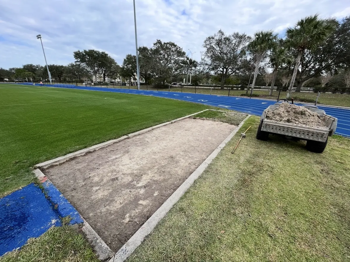 Athletic field work area cleared and prepared after lawn work